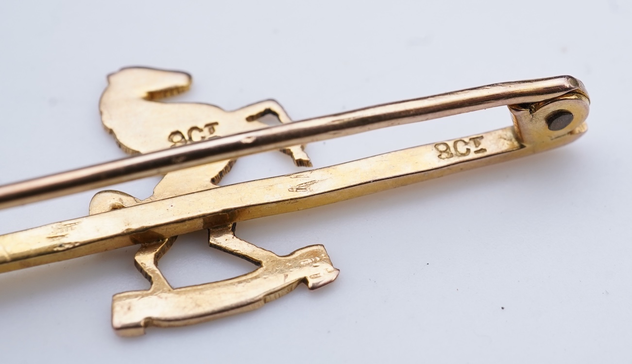 Four brooches and a gold signet ring